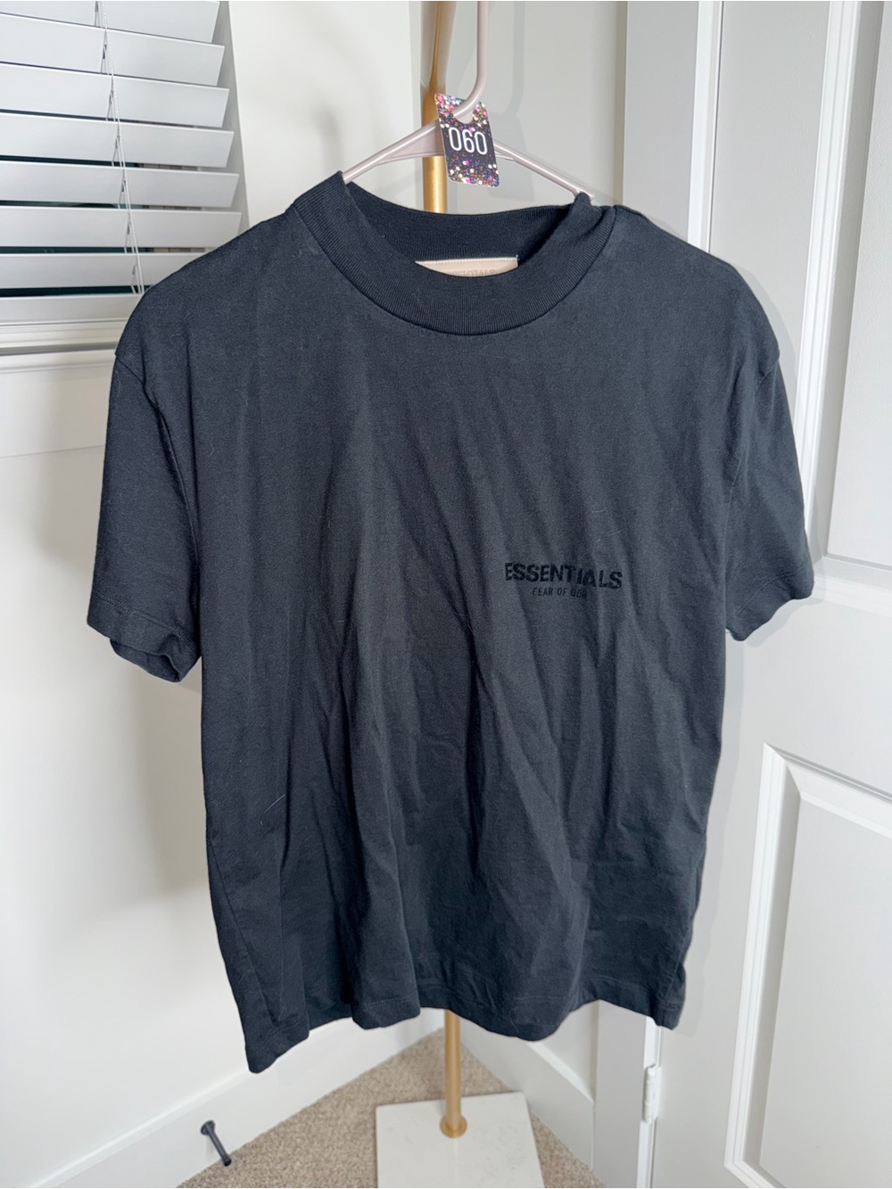 60. ESSENTIALS Fear of God Black Logo Tee